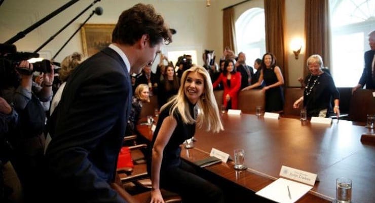 Canadian Prime Minister Justice Trudeau, left, Ivanka Trump, to his right, and President Donald J. Trump, right to back of room, greet before a roundtable discussion on women business leaders.