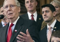 House Speaker Paul Ryan of Wisconsin and others listen as Senate Majority Leader Mitch McConnell of Kentucky speaks on Capitol Hill in Washington on Dec. 8, 2016.