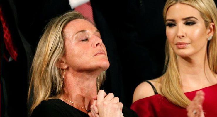 Carryn Owens, the widowed wife of Navy SEAL Ryan Owens, who was killed in action during a special operations raid in Yemen, receives a near 2-minute standing ovation when recognized by President Donald J. Trump during his address to a joint session of Congress on Tuesday Feb. 28, 2017.
