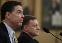 FBI Director James Comey, left, accompanied by National Security Agency Director Michael Rogers, testifies on Capitol Hill in Washington Monday. (Photo: AP)
