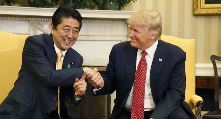 Japanese Prime Minister Shinzo Abe shakes hands with President Donald Trump during their meeting in the Oval Office, February 10, 2017. (Photo: Reuters)