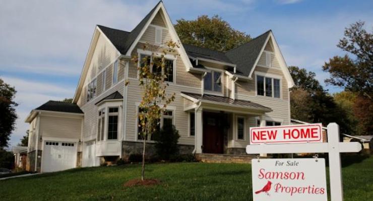 A real estate sign advertising a new home for sale is pictured in Vienna, Virginia, U.S. October 20, 2014. (Photo: Reuters)