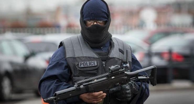 An elite police officer patrols at Orly airport, south of Paris, Saturday, March, 18, 2017. A man was shot to death Saturday after trying to seize the weapon of a soldier guarding Paris' Orly Airport, prompting a partial evacuation of the terminal, police said. (Photo: AP)