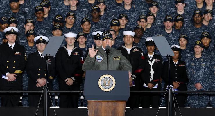 President Donald J. Trump speaks with Sailors in the hangar bay aboard Pre-Commissioning Unit Gerald R. Ford (CVN 78) on March 2, 2017. The president ,et with Sailors and shipbuilders of the Navy's first-in-class aircraft carrier during an all-hands call inside the ship's hangar bay. (Photo: Courtesy of U.S. Navy/Released)