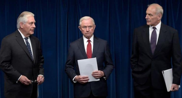 Secretary of State Rex Tillerson, left, Attorney General Jeff Sessions, center, and Secretary of the Department of Homeland Security (DHS) John Kelly, right, hold a press conference to announce a new executive order travel ban signed by President Donald J. Trump.