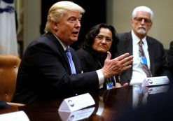 U.S. President Donald J. Trump (C), flanked by Gary Masino (L) of the Sheet Metal Workers Union, Telma Mata (2nd R) of the Heat and Frost Insulators Allied Workers Local 24 and United Brotherhood of Carpenters General President Doug McCarron (R), holds a roundtable meeting at the White House on Jan. 27. 2017. (Photo: Reuters)