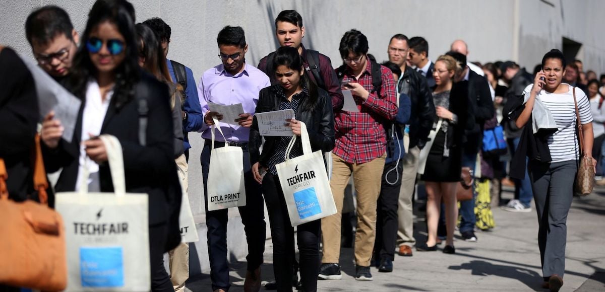 People wait in line to attend TechFair LA in Los Angeles, Calif. (Photo: Reuters)