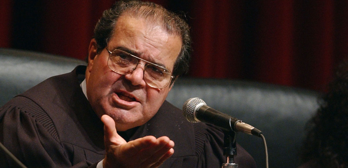The late and great Supreme Court Justice Antonin Scalia poses a question to plaintiffs in 2005. (Photo: AP)