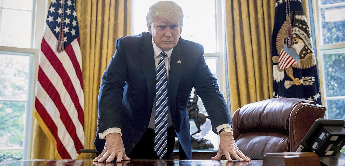 President Donald Trump poses for a portrait in the Oval Office in Washington, Friday, April 21, 2017. (Photo: AP)