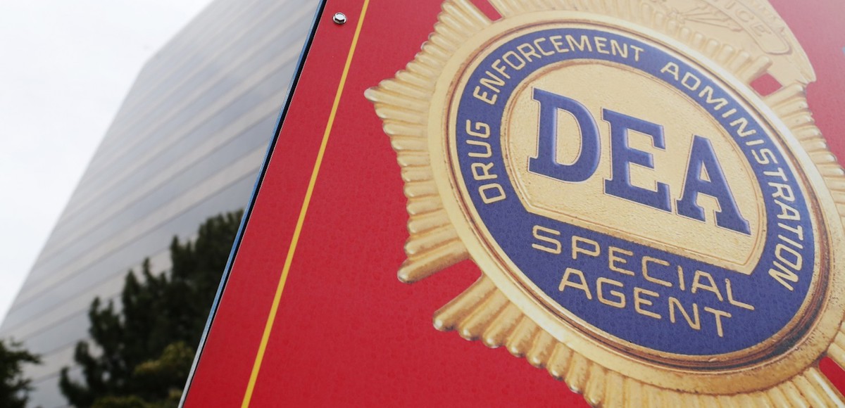 A sign with a DEA badge marks the entrance to the U.S. Drug Enforcement Administration (DEA) Museum in Arlington. (Photo: Reuters)