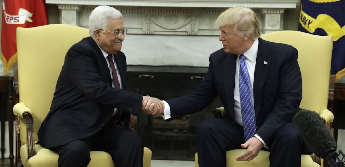 President Donald J. Trump shakes hands with with Palestinian leader Mahmoud Abbas during their meeting in the Oval Office of the White House, May 3, 2017, in Washington. (Photo: AP)