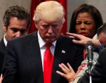 Members of the clergy lay hands and pray over then-Republican presidential nominee Donald J. Trump at the New Spirit Revival Center in Cleveland Heights, Ohio. (Photo: Reuters)