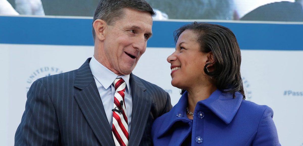 Michael Flynn and Susan Rice shake hands at a January 10 event in Washington. (Photo: Reuters)