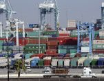 Cargo containers sit idle at the Port of Los Angeles as a back-log of over 30 container ships sit anchored outside the Port in Los Angeles, California, February 18, 2015. (Photo: Reuters)