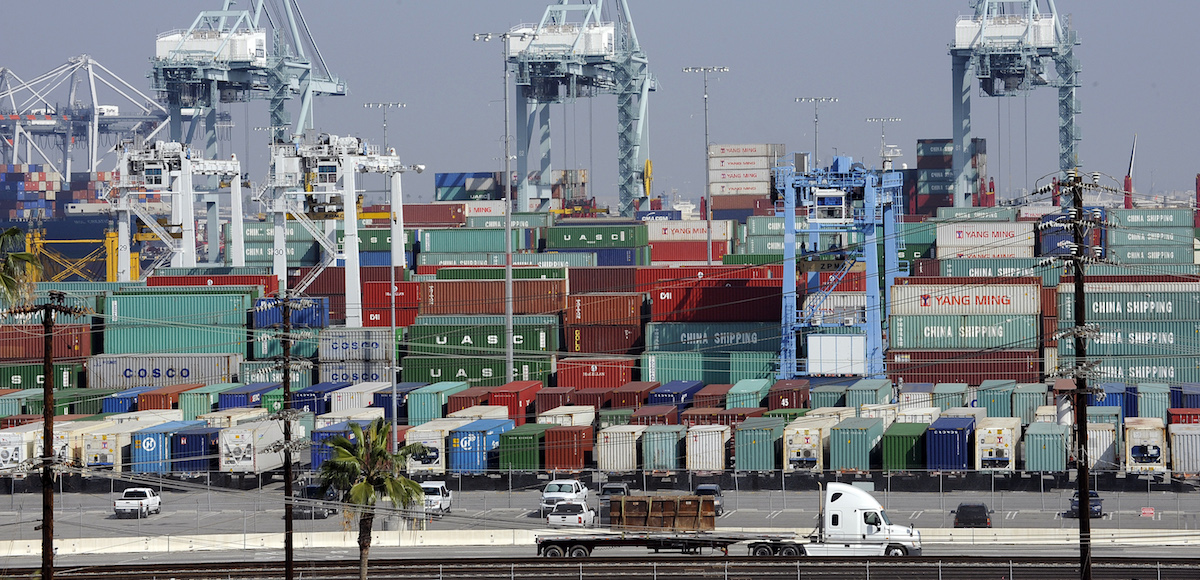 Cargo containers sit idle at the Port of Los Angeles as a back-log of over 30 container ships sit anchored outside the Port in Los Angeles, California, February 18, 2015. (Photo: Reuters)