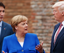 German Chancellor Angela Merkel, center, talks with Canadian Prime Minister Justin Trudeau, left, and President Donald Trump during a family photo with G7 leaders at the Ancient Greek Theater of Taormina during the G7 Summit, Friday, May 26, 2017, in Taormina, Italy. (Photo: AP)