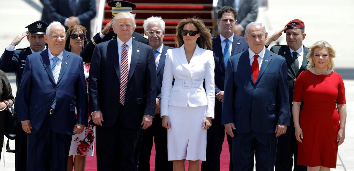 U.S. President Donald Trump (2nd L) and first lady Melania Trump (3rd L) stand with Israeli Prime Minister Benjamin Netanyahu (2nd R), his wife Sara (R) and Israel's President Reuven Rivlin (L) upon their arrival at Ben Gurion International Airport in Lod near Tel Aviv, Israel May 22, 2017. (Photo: Reuters)