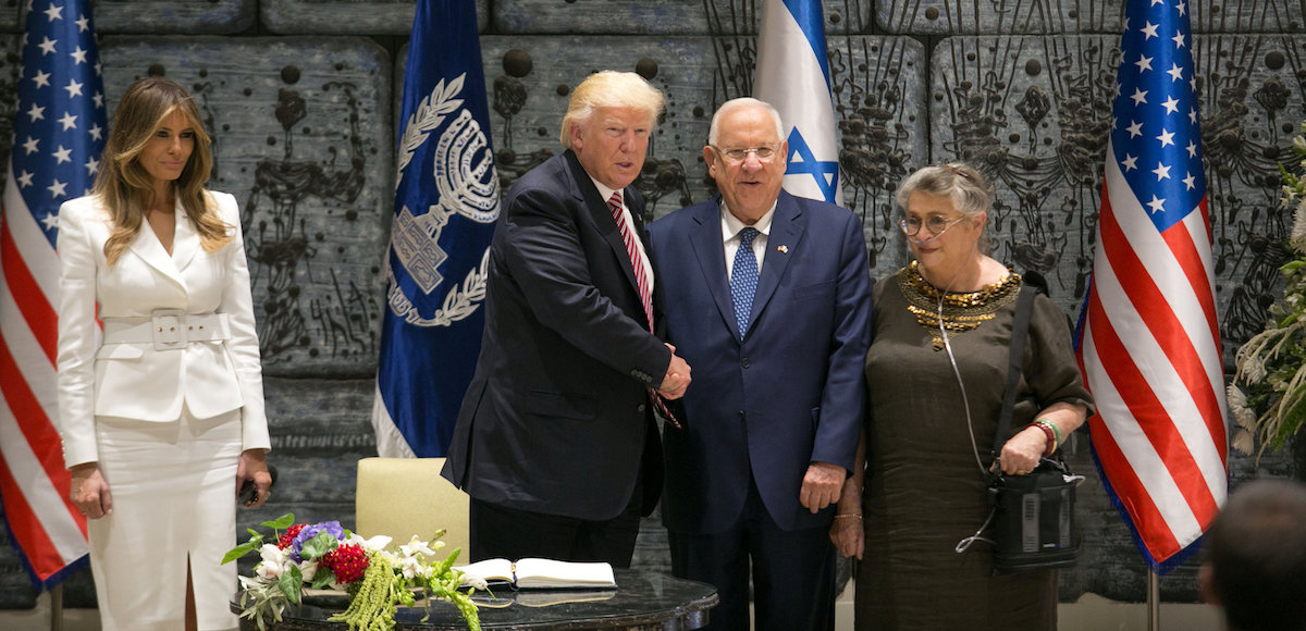 U.S. President Donald Trump (2nd L) shakes hands, after signing the guest book, with Israeli President Reuven Rivlin (2nd R) with his wife Nechama Reuven (R) and first lady Melania Trump (L), in Jerusalem May 22, 2017. (Photo: Reuters)