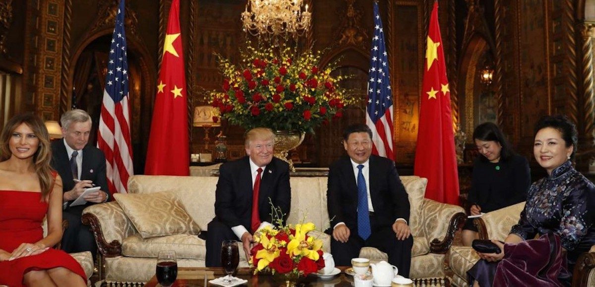 Presidents Donald J. Trump and Chinese President Xi Jinping sit with first ladies Melania Trump and Peng Liyuan before dinner at Mar-a-Lago in Palm Beach, Florida, on April 6. (Photo: AP)