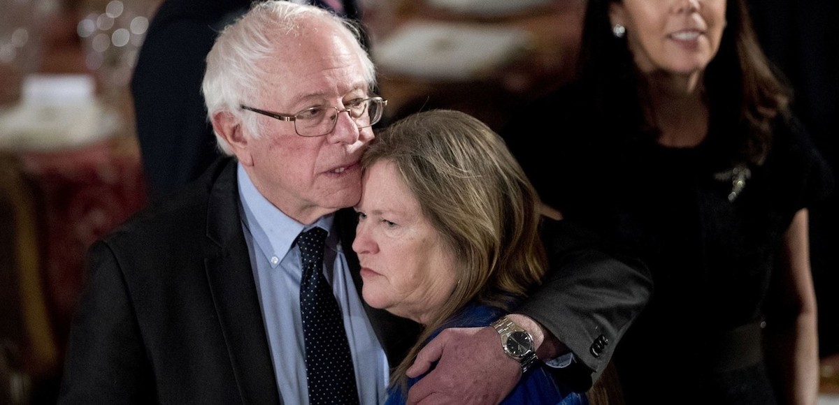 Sen. Bernie Sanders, I-Vt., hugs his wife Jane O’Meara Sanders, during the inaugural luncheon in honor of President Donald Trump at the Statuary Hall in the Capitol, Friday, Jan. 20, 2017, in Washington. (Photo: AP)