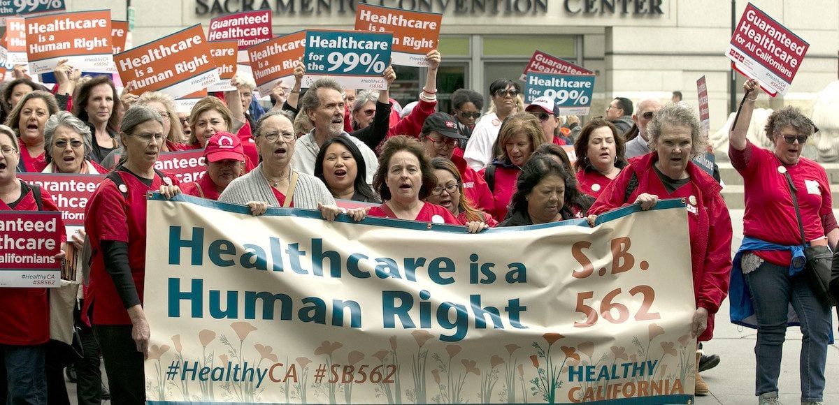 Protestors at the Sacramento Convention Center show support for the state's single-payer healthcare legislation. (Photo: AP)