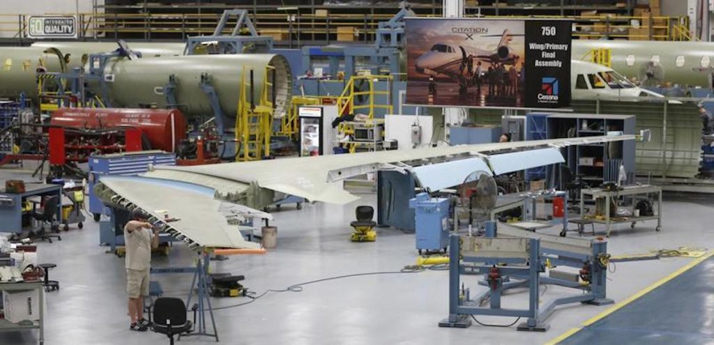 Nathan Rogers works on the jet assembly line at Cessna, at their manufacturing plant in Wichita, Kansas March 12, 2013. (Photo: Reuters)