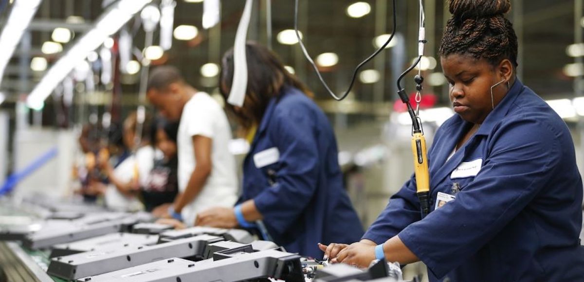 A factory worker at a New York manufacturing plant. (Photo: Reuters)