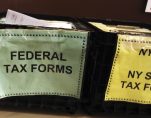 FILE PHOTO - Crates filled with 2011 tax forms are seen at the 96th Street Public Library in New York April 17, 2012. (Photo: Reuters)