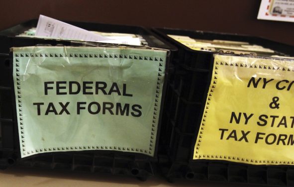 FILE PHOTO - Crates filled with 2011 tax forms are seen at the 96th Street Public Library in New York April 17, 2012. (Photo: Reuters)