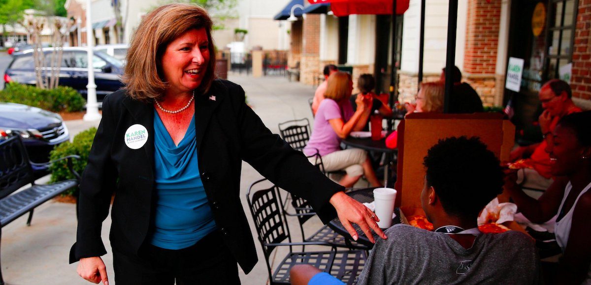 Republican Karen Handel campaigns for the special election in Georgia's 6th Congressional District special election. In this photo, Handel talks to supporters during a campaign stop at Santino’s Italian Restaurant & Pizzeria in Alpharetta, Georgia. (Photo: Reuters)
