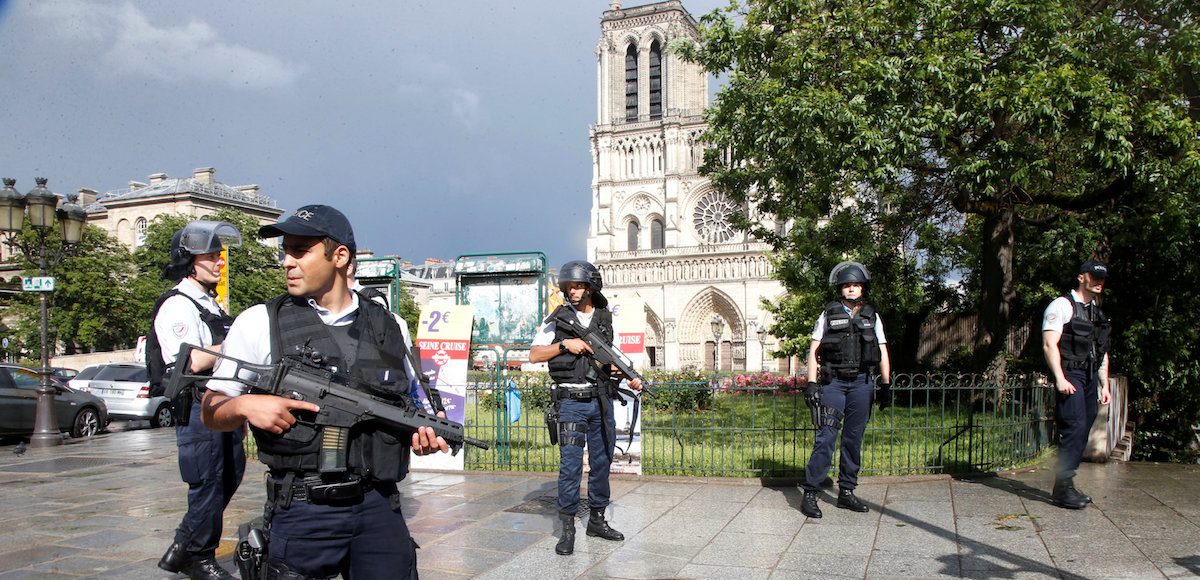French police stand at the scene of a shooting incident near the Notre Dame Cathedral in Paris, France, June 6, 2017. (Photo: Reuters)