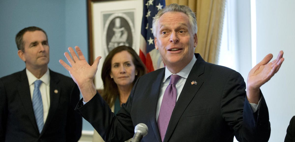 Virginia Gov. Terry McAuliffe, right, gestures during a news conference as his wife, Dorothy and Lt. Gov. Ralph Northam, left, listen at the Capitol in Richmond, Va., Tuesday, Jan. 10, 2017. (Photo: AP)