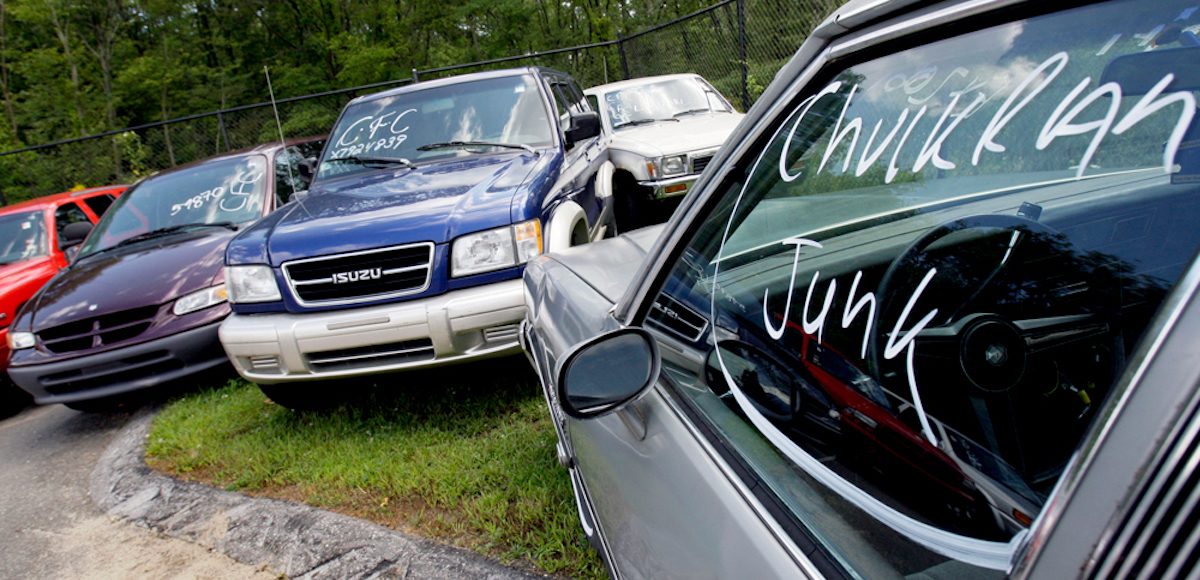 Vehicles traded in for the government's Cash for Clunkers program are seen at a lot owned by Ira Toyota in Danvers, Mass. Monday, Aug. 24, 2009. It was a race to the finish for dealers and customers alike as the Cash for Clunkers program headed into its final lap on Monday. Over the weekend, car dealers across the country watched their lots grow empty as crowds rushed to trade in gas guzzlers after the government said that the $3 billion rebate program would end at 8 p.m. EDT Monday, two weeks earlier than expected. (Photo: AP)