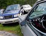Vehicles traded in for the government's Cash for Clunkers program are seen at a lot owned by Ira Toyota in Danvers, Mass. Monday, Aug. 24, 2009. It was a race to the finish for dealers and customers alike as the Cash for Clunkers program headed into its final lap on Monday. Over the weekend, car dealers across the country watched their lots grow empty as crowds rushed to trade in gas guzzlers after the government said that the $3 billion rebate program would end at 8 p.m. EDT Monday, two weeks earlier than expected. (Photo: AP)