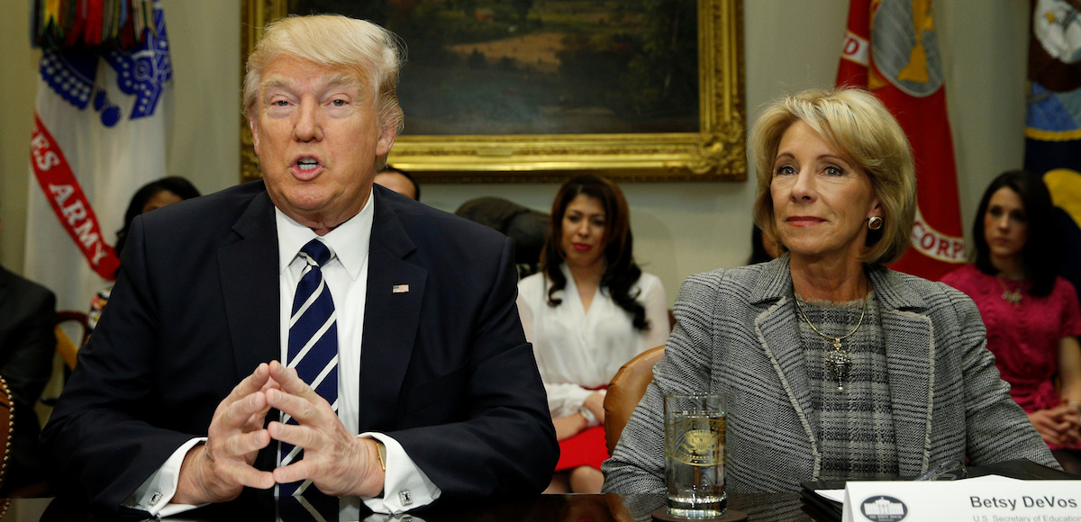 President Donald J. Trump and Education Secretary Betsy DeVos meet with parents and teachers at Saint Andrew Catholic School in Orlando, Florida, March 3, 2017. (Photo: Reuters)