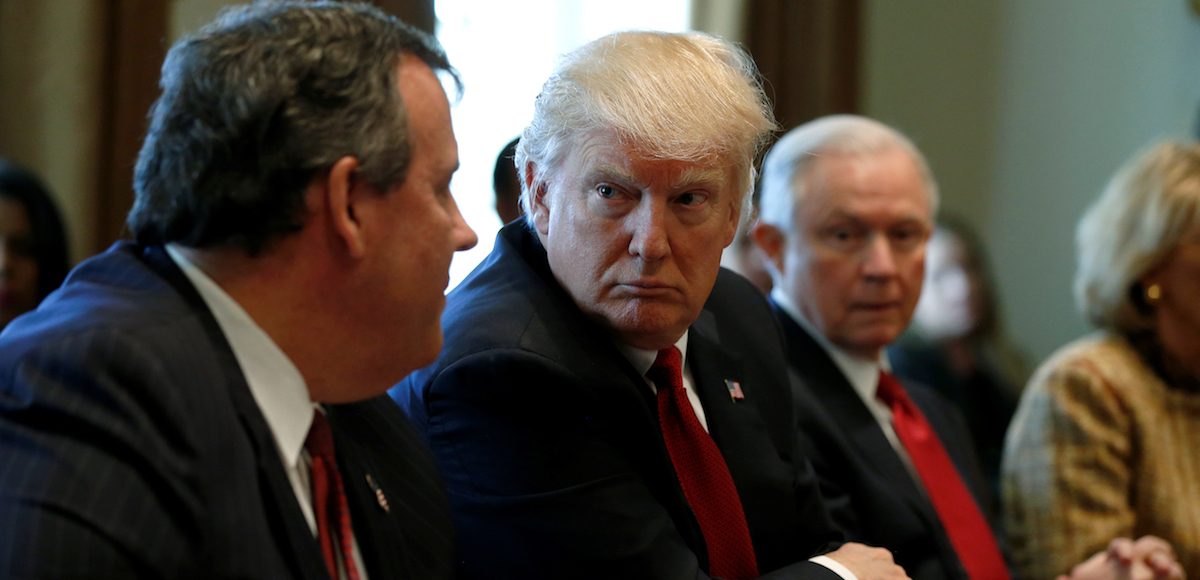 President Donald J. Trump, flanked by New Jersey Gov. Chris Christie and Attorney General Jeff Sessions, holds an opioid and drug abuse listening session at the White House in March 29, 2017. (Photo: Reuters)
