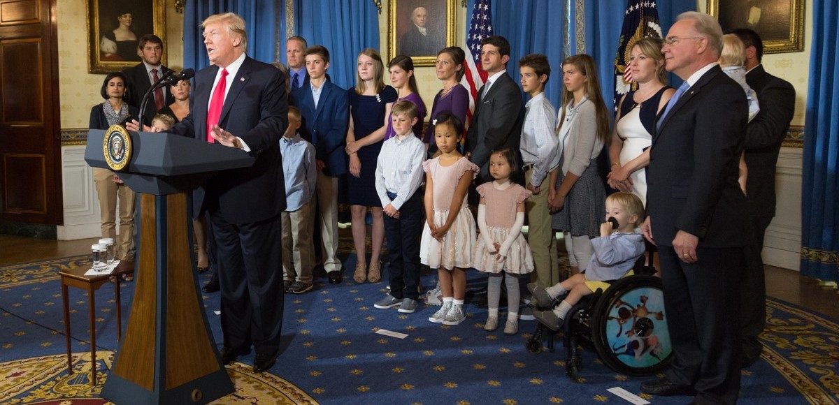 U.S. President Donald Trump calls on Republican Senators to move forward and vote on a healthcare bill to replace the Affordable Care Act, as people negatively affected by the law stand behind him, in the Blue Room of the White House in Washington, U.S., July 24, 2017. (Photo: Reuters)