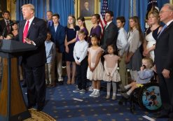 U.S. President Donald Trump calls on Republican Senators to move forward and vote on a healthcare bill to replace the Affordable Care Act, as people negatively affected by the law stand behind him, in the Blue Room of the White House in Washington, U.S., July 24, 2017. (Photo: Reuters)
