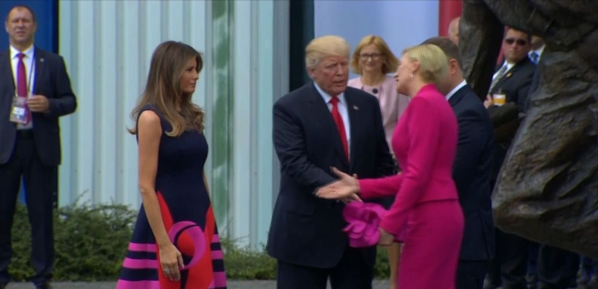 President Donald Trump, center, with Polish President Andrej Duda standing behind First Lady Agata Kornhauser-Duda. First Lady Melania Trump, left.