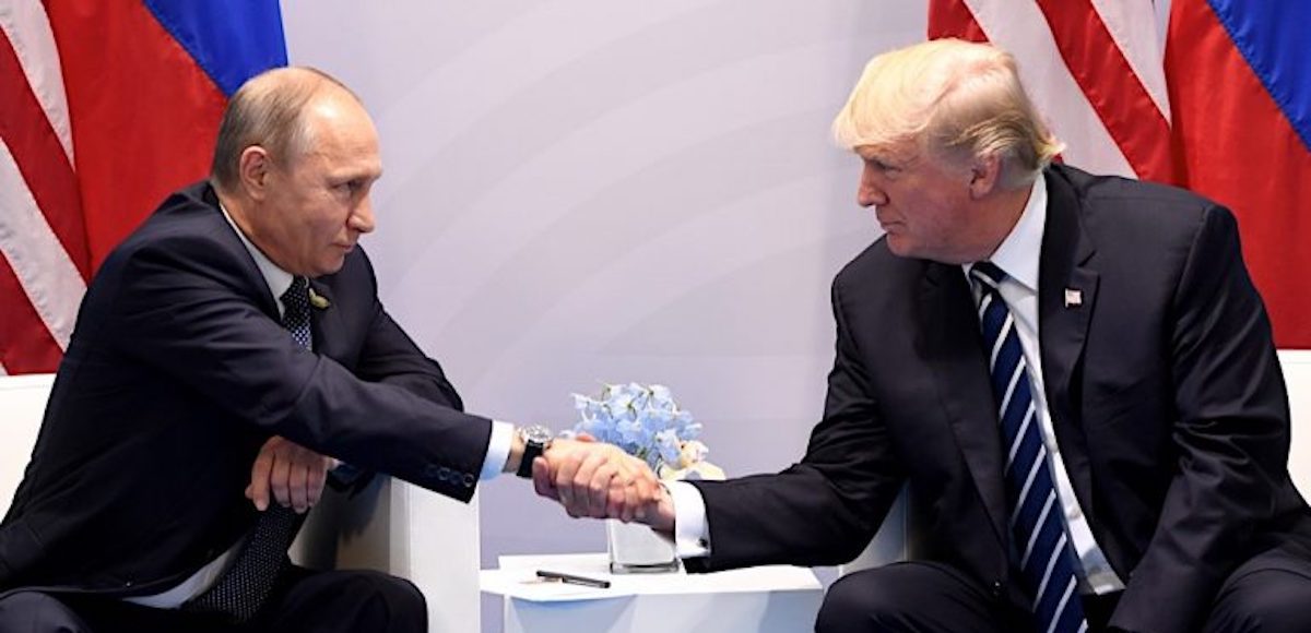 U.S. President Donald Trump and Russian President Vladimir Putin shake hands during the G20 Summit in Hamburg, Germany on July 7, 2017.