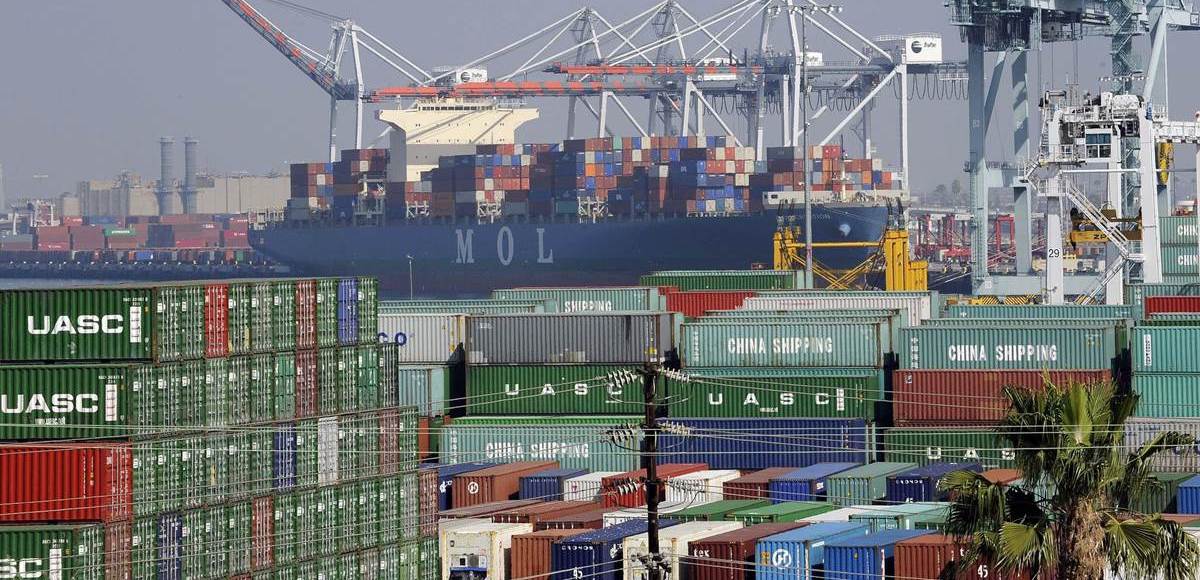 Cargo containers sit idle at the Port of Los Angeles as a back-log of over 30 container ships sit anchored outside the Port in Los Angeles, California, February 18, 2015. (Photo: Reuters)