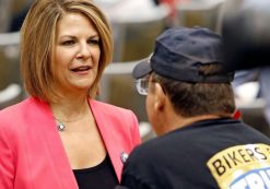 Kelli Ward, a rival of Sen. John McCain and candidate in the Arizona Republican primary for U.S. Senate in 2018, speaks with a supporter of President Donald J. Trump. (Photo: Associated Press)