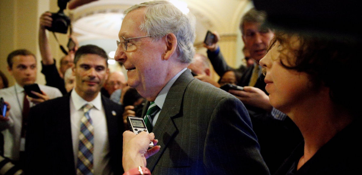 Senate Majority Leader Mitch McConnell, R-Kty., is trailed by reporters as he walks to the Senate floor of the U.S. Capitol after unveiling a draft bill on healthcare on June 22, 2017. (Photo: Reuters)