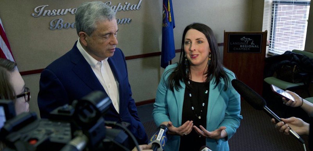 Michigan Republican Party Chairman Ron Weiser and Republican National Committee Chairwoman Ronna Romney McDaniel address the media at the Lansing Regional Chamber of Commerce in Lansing, Mich., Friday, May 5, 2017. McDaniel met with Michigan Hispanic business owners and community members. (Photo: AP)