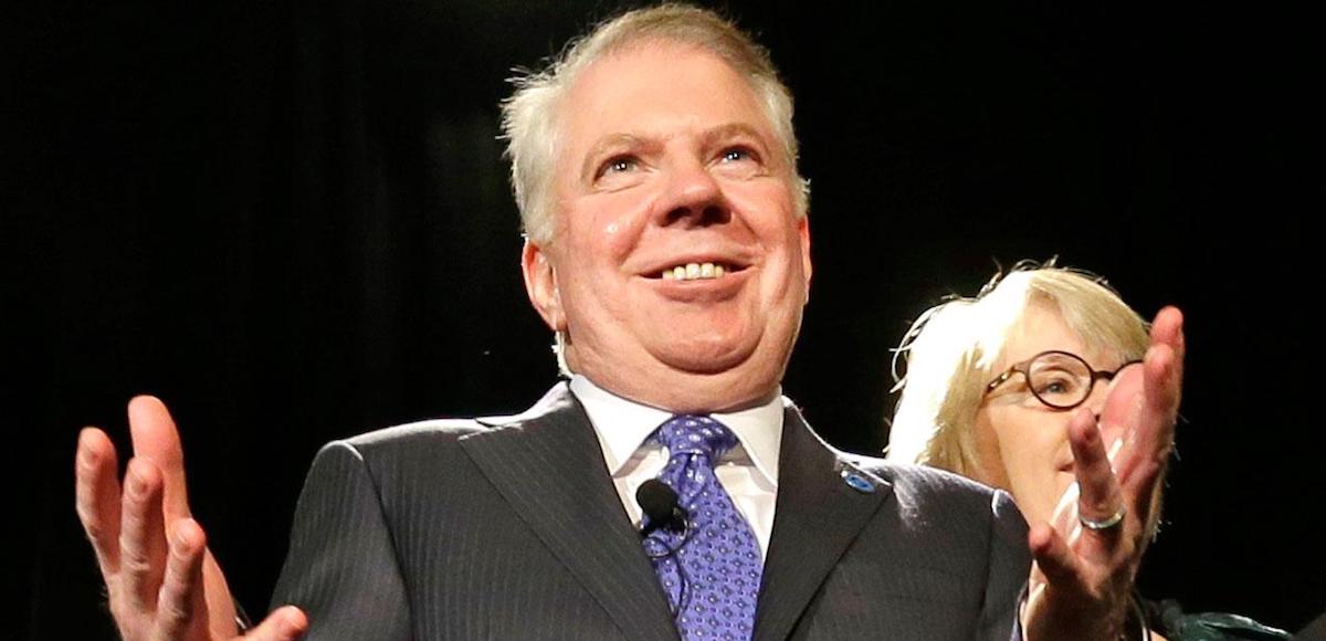 Seattle Mayor Ed Murray, center, motions as he stands with other city officials following an inauguration ceremony for city officials Monday, Jan. 6, 2014, in Seattle. (Photo: AP)