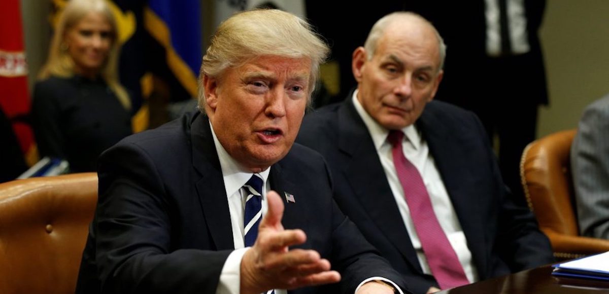 Homeland Security Secretary John Kelly, right, listens to U.S. President Donald Trump during a meeting with cyber security experts in the Roosevelt Room of the White House in Washington January 31, 2017. (Photo: Reuters)