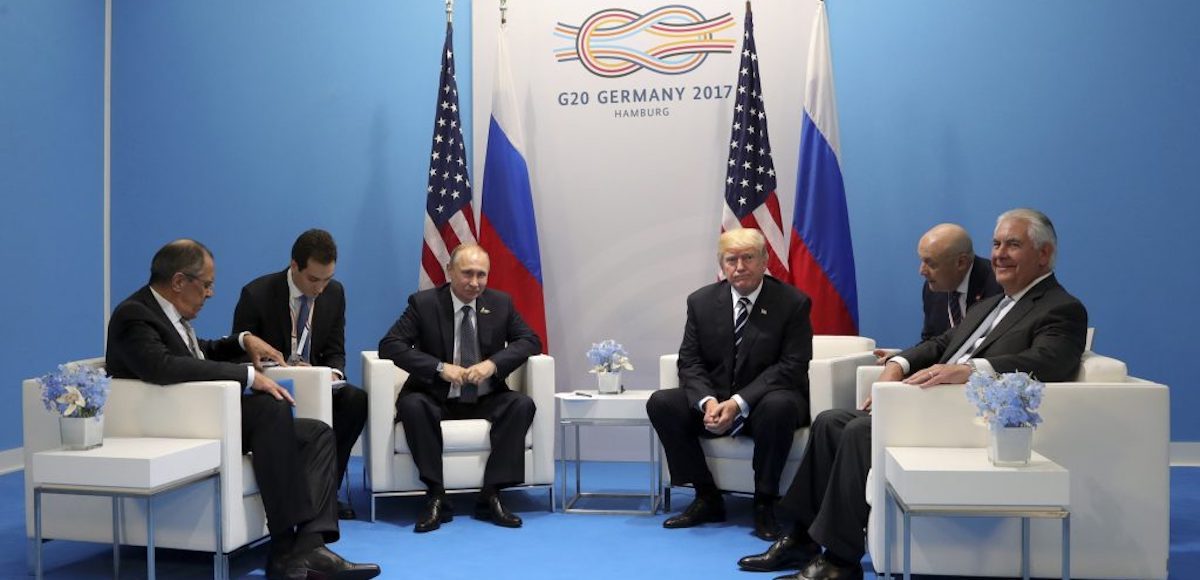 U.S. President Donald Trump (third from right) and Secretary of State Rex Tillerson (right) meet with Russian President Vladimir Putin (third from left) and Foreign Minister Sergey Lavrov (left) at the G20 summit in Hamburg, Germany on July 7. (Photo: Kremlin via Reuters)