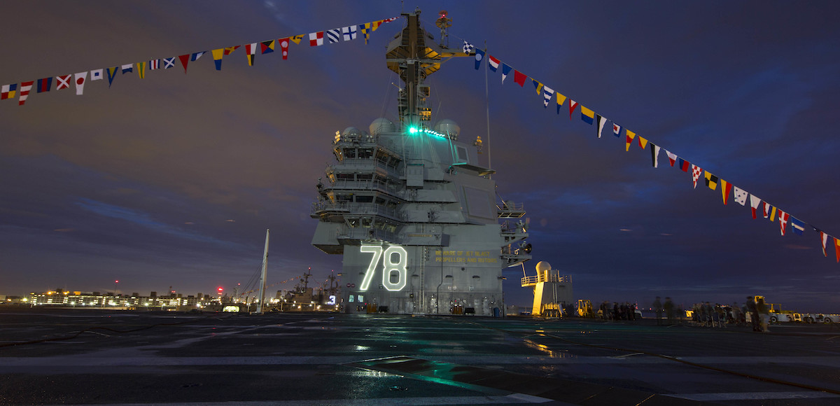 NEWPORT NEWS (July 4, 2017) The Pre-Commissioning Unit Gerald R. Ford (CVN 78) displays “up and over” flags in observance of Independence Day. Ford is making preparations for commissioning July 22. (U.S. Navy photo by Mass Communication Specialist 2nd Class Ryan Litzenberger/Released)