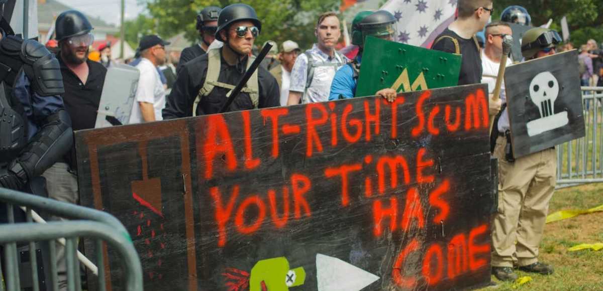 Antifa, or Antifascist Action, armed and protesting before clashing with white supremacist groups in Charlottesville, Virginia on Saturday, August 12, 2017. (Photo: AP)