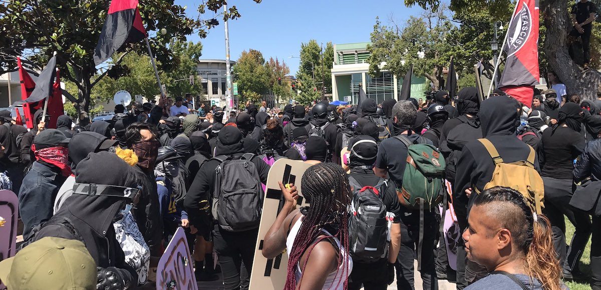 Antifa, otherwise known as so-called anti-fascists, gather outside Martin Luther King Jr. Civic Center Park during a protest in Berkeley, California, on Sunday, August 27th, 2017.